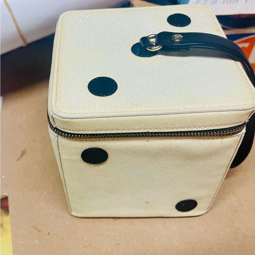 Adorable Kate Spade small bag 
Dice shaped in black and cream